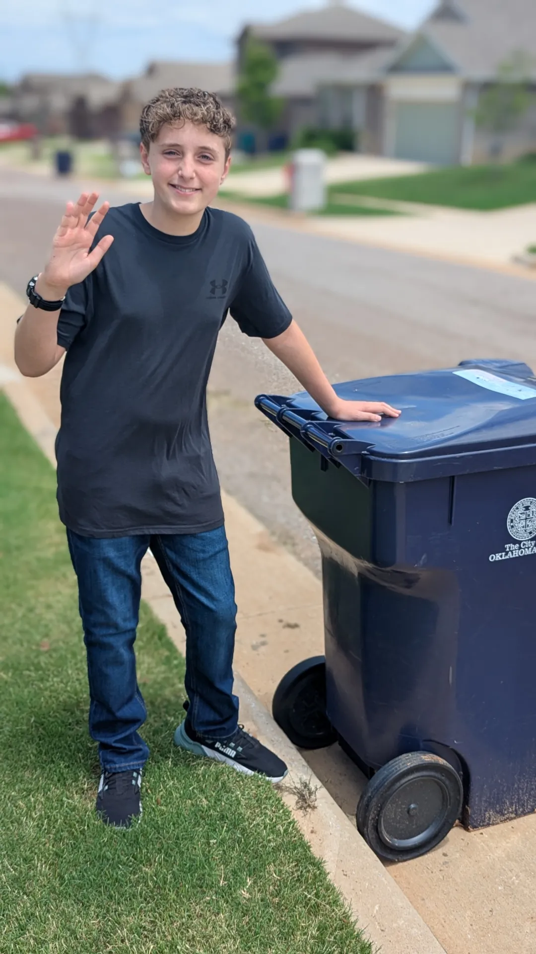 Empty trash cans returned to side of house after Monday pickup